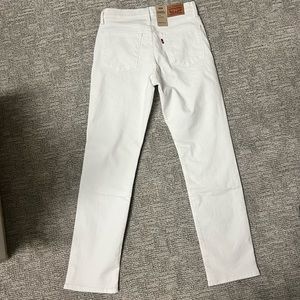 Levis mid rise white denim jeans classic straight led. Size 4 medium W27 L30